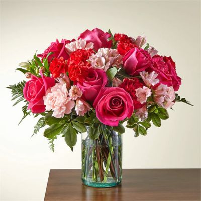 Handcrafted and inspired by the gorgeous hues of the season, the You’re Precious Bouquet is full of sweet sentiment for your favorite person. Hot pink roses, red carnations, pink alstroemeria, and pale pink carnations come together in a clear glass vase to make any room feel beautiful and light. From special birthdays to simply just because, this arrangement is a stunning gift to give your loved ones for every occasion.