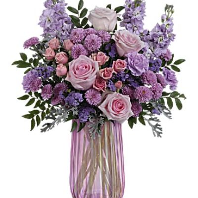 <div id="mark-3" class="m-pdp-tabs-marketing-description">What a delight! Overflowing with pink roses and lavender blooms, this decadent Mother's Day bouquet shines in an iridescent pink glass vase that Mom is sure to adore.</div>
 
<div id="desc-3">Pink roses, pink spray roses, lavender carnations, lavender stock, lavender button spray chrysanthemums and lavender sinuata statice are arranged with huckleberry and silver lace dusty miller.</div>