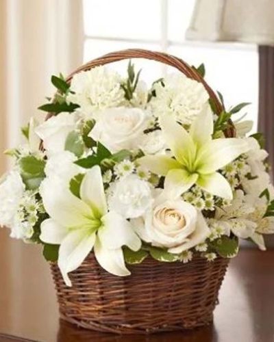 <p>The Peace, Love & Hope Basket in white offers a pure and elegant tribute that speaks from the heart. Handcrafted with care, this serene basket includes pristine white roses, lilies, alstroemeria, carnations, mini carnations, and monte casino.</p>