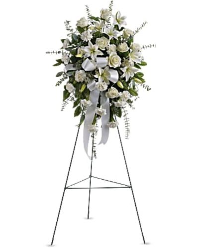 <p>Share a message of peace and remembrance with a beautifully simple standing spray that offers comfort through timeless white blooms and elegant presentation. This refined spray features pure white roses, white Asiatic lilies, and white carnations—each chosen for its symbolic purity, love, and eternal peace.</p>
