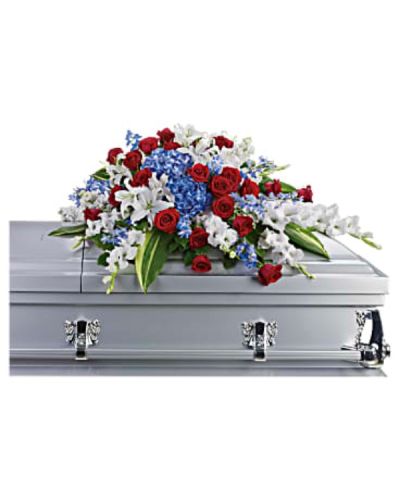 <p>Honor a life dedicated to service with a proud and timeless casket spray designed to reflect the values of courage, sacrifice, and love of country. This striking display features bold blue hydrangea and delphinium, symbolizing loyalty and peace.</p>
