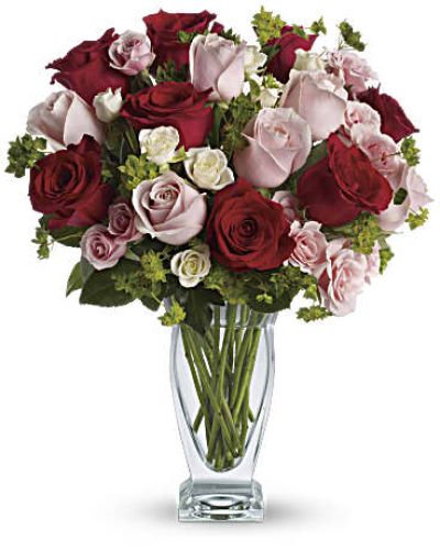 <p>A rich blend of red, pink, and white roses creates a stunning harmony of color and meaning. Deep red roses signify passion, soft pinks evoke tenderness, and delicate white spray roses add a layer of purity and sweetness.</p>