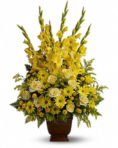 <p>Celebrate a life that radiated warmth, kindness, and joy with a vibrant floral tribute designed to honor someone whose presence brightened every room. The design features a bold mix of yellow blooms, including roses, gladioli, and chrysanthemums, all complemented by fresh fern and lush greenery.</p>