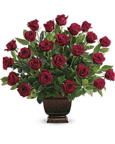 <p>This striking display features two dozen fresh red roses carefully accented with lush salal greenery. Each tribute is handcrafted by expert florists who select fresh, high-quality roses and greenery, arranging them with care and artistry.</p>