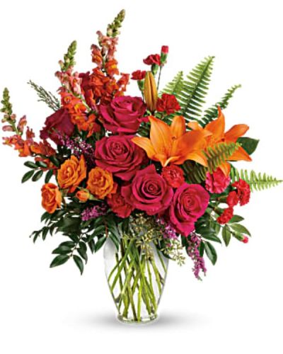 <p>This bouquet bursts with personality, featuring hot pink roses, orange spray roses, fiery orange asiatic lilies, and rich hot pink carnations. Red miniature carnations, lively orange snapdragons, and pink heather round out the color story with layered texture and dimension.</p>