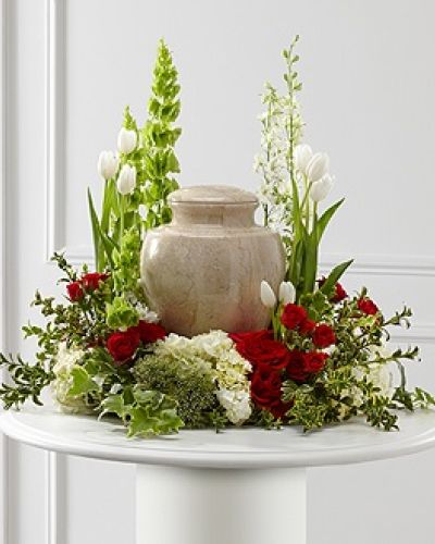 <p>This exquisite tribute features a rich variety of premium blooms, including vivid red roses and red spray roses for heartfelt emotion, paired with the quiet purity of white tulips and hydrangea.</p>