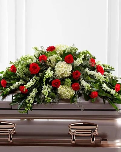 <p>Honor a life well lived with this heartfelt casket spray, a floral tribute that offers comfort, beauty, and quiet strength during times of loss. This refined design is filled with rich, vibrant blooms carefully chosen to convey love, respect, and enduring remembrance.</p>