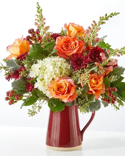 <p>Burgundy, orange and cream florals are beautifully designed in this seasonal pitcher to adorn your fall gatherings, celebrate a special day, or make someone's brighter.</p>