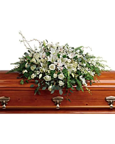<p>Celebrate a life of grace and dignity with an extraordinary standing spray that conveys deep love, respect, and serenity. This grand design features a luxurious blend of white hydrangea, cymbidium orchids, dendrobium orchids, and classic white roses.</p>