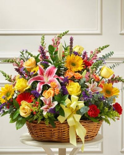 <p>The Bright Blessings Sympathy Arrangement in Basket delivers warmth, comfort, and a message of resilience through every petal. Overflowing with vibrant beauty, this sympathy arrangement includes a generous mix of sunflowers, Gerbera daisies, orange spray roses, lilies, carnations, and other fresh seasonal blooms.</p>