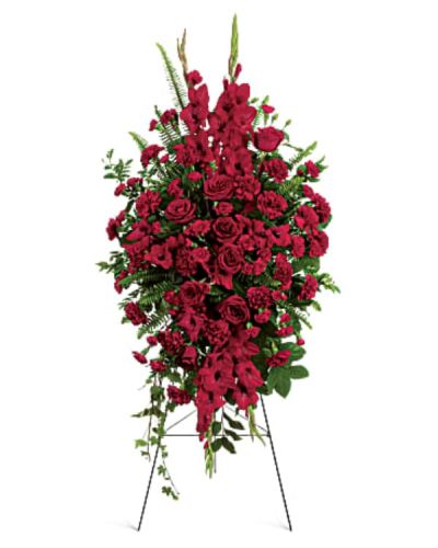<p>Honor a cherished life with a rich and elegant standing arrangement composed of deep red blooms that express enduring love, respect, and heartfelt sorrow. Designed to stand proudly at the service, this sympathy spray is a timeless gesture of remembrance, offering comfort to grieving hearts and celebrating a life deeply loved.</p>