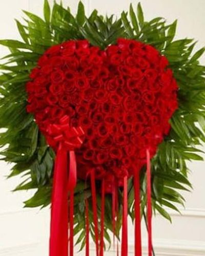 <p>When emotions run deep and words fall short, let a powerful floral tribute speak on your behalf. This heart-shaped standing spray is expertly crafted from a rich gathering of fresh red roses, each bloom symbolizing devotion, respect, and enduring affection.</p>