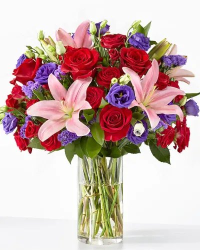 <p>This dreamy jewel toned bouquet combines bold color and eye catching texture to make a statement. Featuring a thoughtful array of both roses and lilies, this dazzling assortment is bound to impress your recipient.</p>