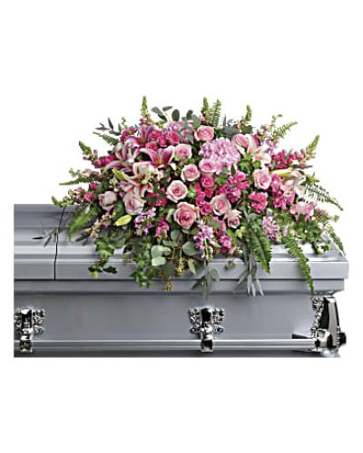 <p>Honor a cherished life with this lush and elegant casket spray that captures the tenderness of heartfelt memories. This breathtaking spray features an artful blend of pink hydrangea, pink roses, and pink spray roses, creating a lush base filled with color and grace.</p>