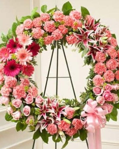 <p>Offer a tender tribute filled with warmth, compassion, and remembrance. The Serene Sympathies Standing Wreath in pink is a graceful symbol of love and support, designed to bring comfort and beauty during a time of sorrow.</p>