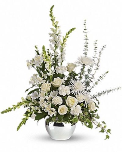 <p>This serene arrangement offers a peaceful expression of sympathy, designed to honor a life marked by grace and dignity with gentle elegance and thoughtful care. The design features a delicate combination of pure white blooms, including roses and other seasonal flowers selected for their freshness and symbolic meaning.</p>