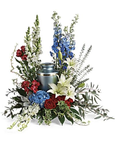 <p>The patriotic bouquet features a stunning mix of red, white, and blue blooms including blue hydrangea, white dendrobium orchids, red roses, white Asiatic lilies, red alstroemeria, red carnations, blue delphinium, and white snapdragons.</p>